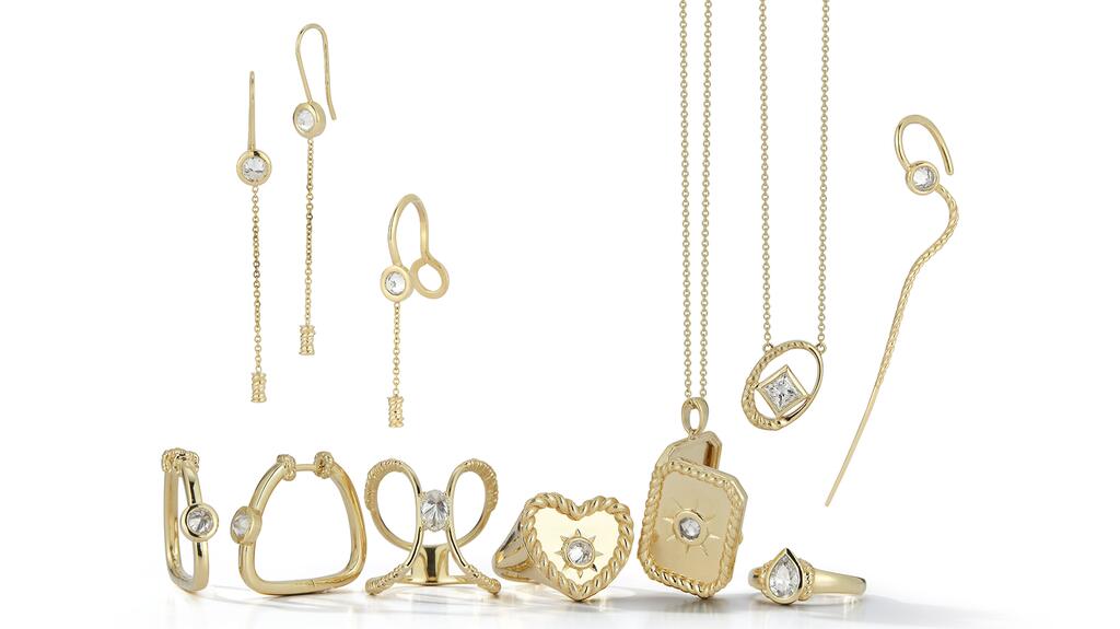 Kassandra Gordon’s capsule collection, “Hairloom,” is crafted entirely in 18-karat yellow gold. It consists of, from left on bottom, the “Ancestry” hoop earrings with 0.60 carats of diamonds ($4,500 retail), the “Crossing Brooders” ring with a 0.70-carat oval-cut diamond ($6,200), the “Heart & Home” ring with a 0.30-carat diamond ($5,000), the Heritage locket with a 0.34-carat diamond ($5,600), and the “Royalty Pear” pinky ring with a 0.77-carat diamond ($7,800). Along the top are the “Dropping Memories” earrings ($3,900), the “Lippy” lip ring ($1,950), the “Legacy” pendant ($6,000) and an ear cuff ($3,000). 20220714_Kassandra Gordon group.jpg